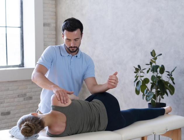 medium-shot-doctor-massaging-patient
